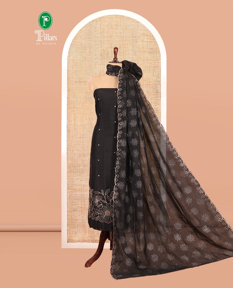 Black Semi-Silk Material Churidar Set, Floral Embroidered Top, a Matching Bottom, and a Scallop Foil Printed Dupatta