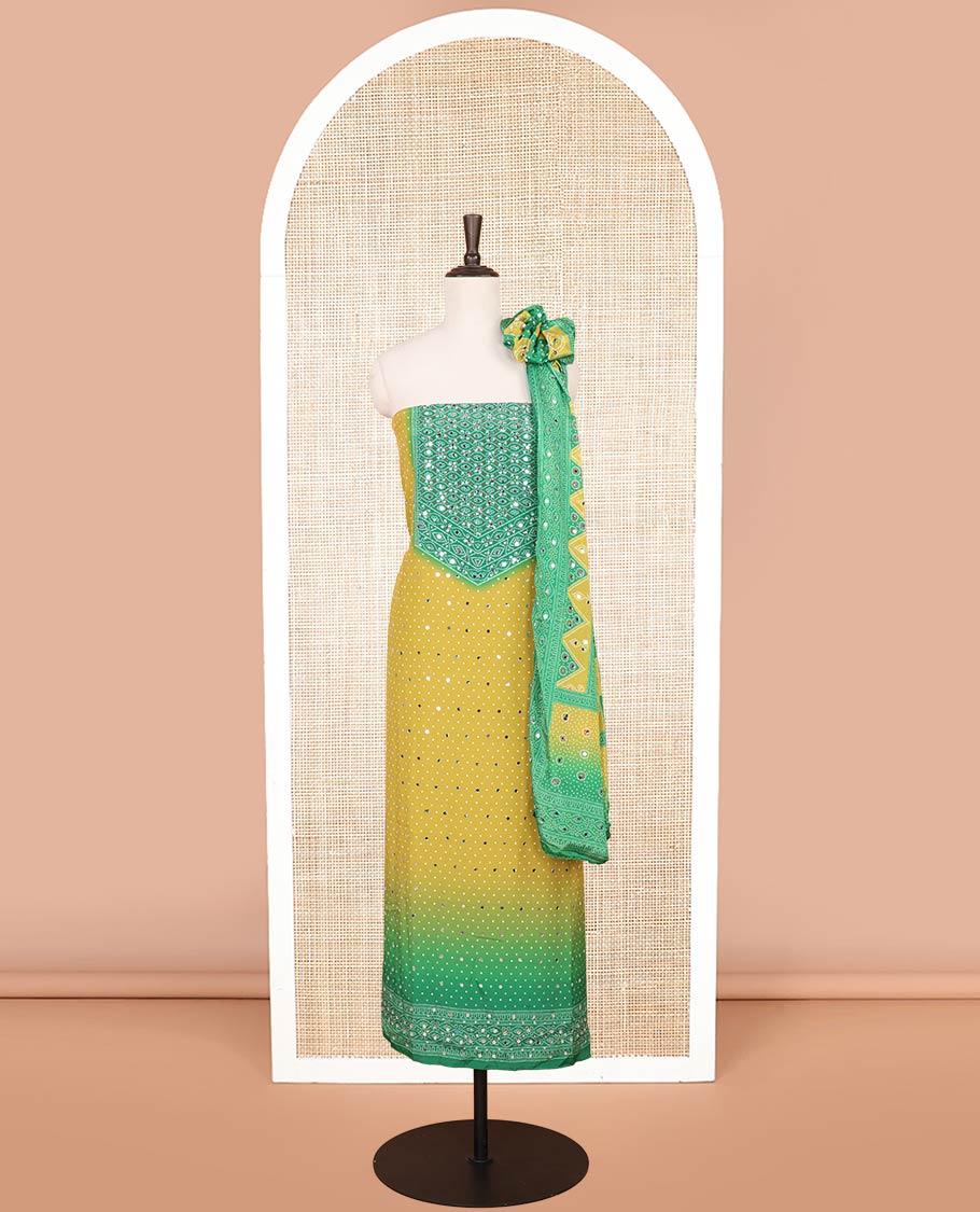 Lemon yellow with green bandhani print stone, mirrror work crepe chudidhar material top with american crepe pant & bhandani print, mirror work dupptata