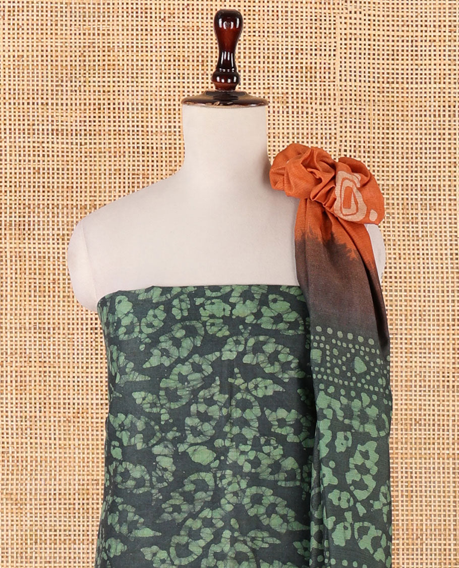 Leaf green chudidhar material, leaf batik-print bhagalpuri cotton top,contrast batik-print bottom & dual-color printed mul-mul dupatta