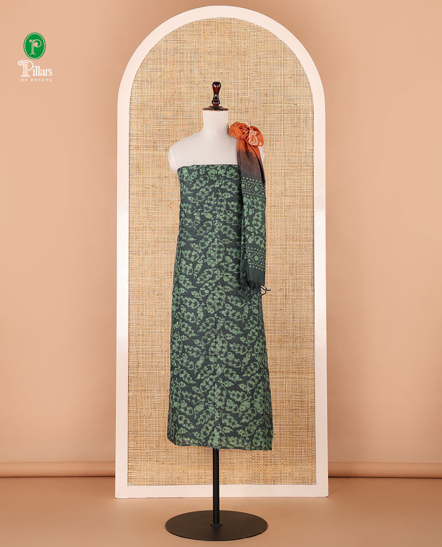 Leaf green chudidhar material, leaf batik-print bhagalpuri cotton top,contrast batik-print bottom & dual-color printed mul-mul dupatta