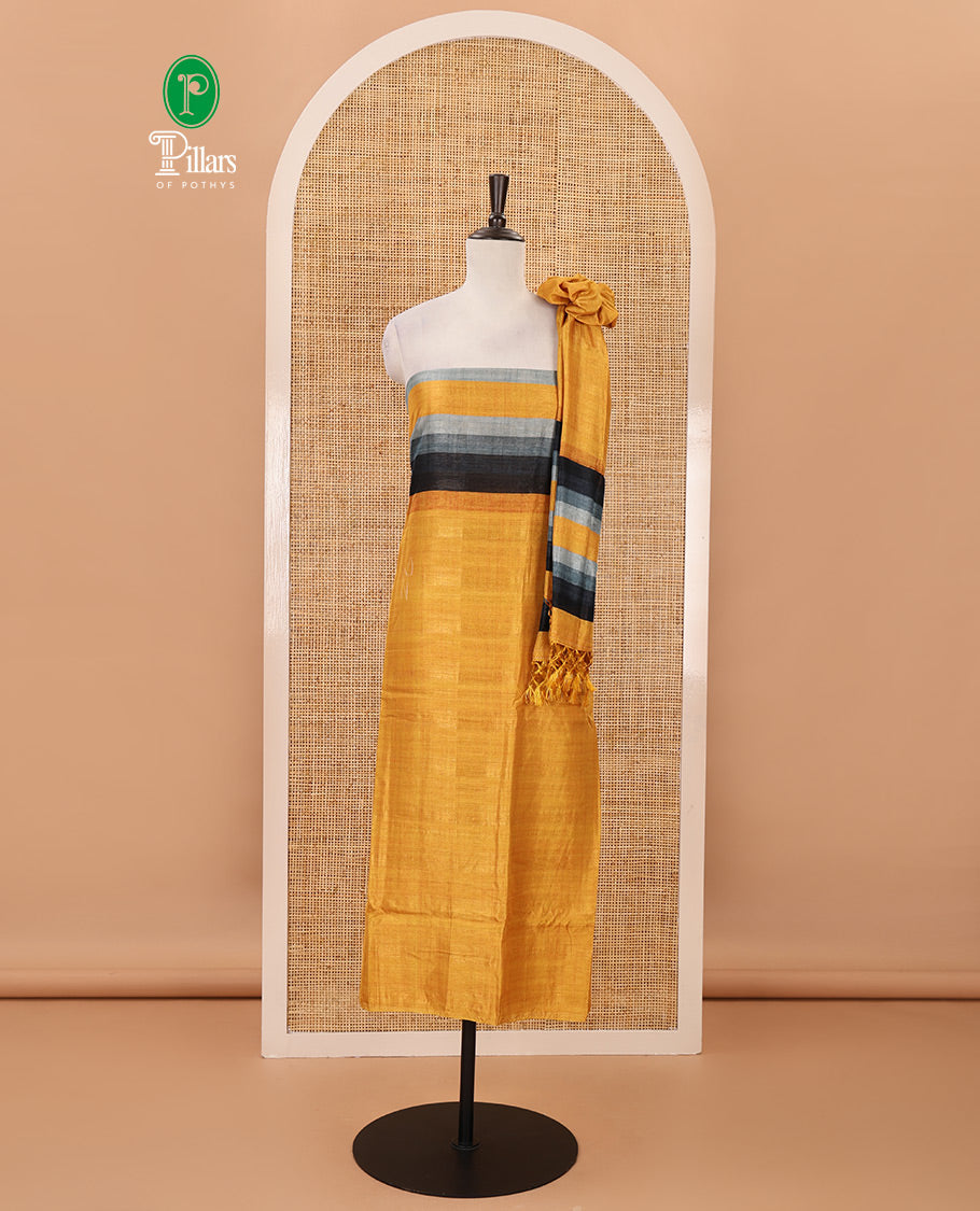 Mustard material chudidar set, horizontal ombre striped semi-tussar top, plain santoon bottom & horizontal ombre striped dupatta with tassels