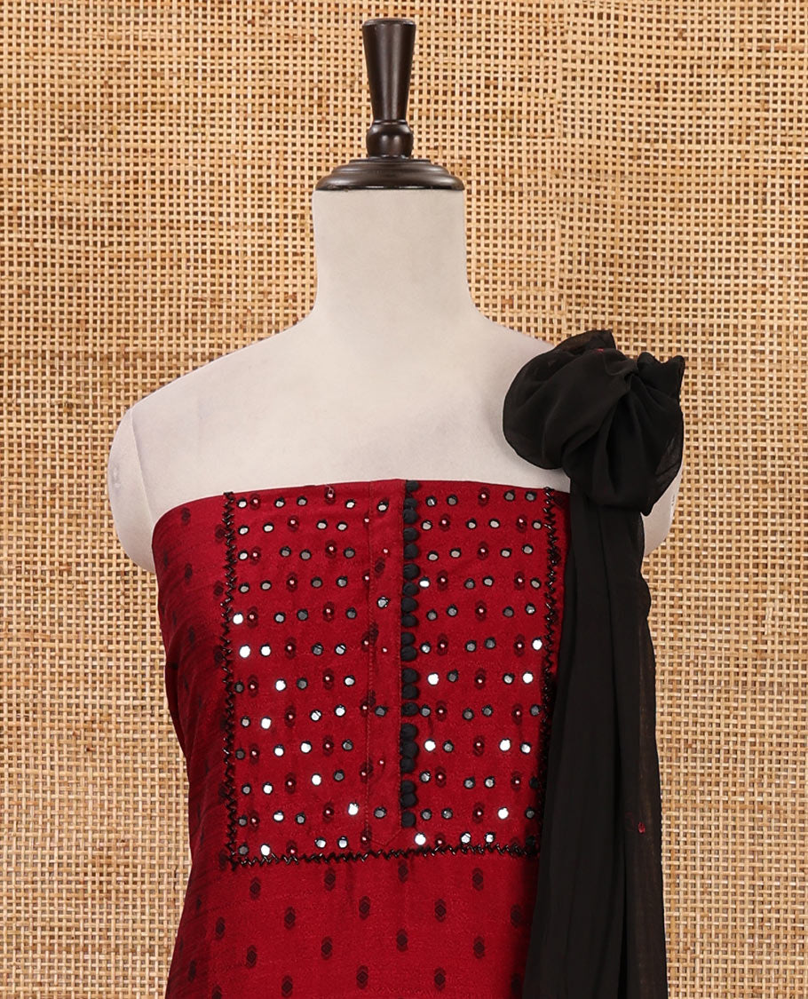 Rani pink material chudidar set, black beads & mirror neck embroidered with buttas woven vichitra silk top, santoon bottom & contrast mirror work chiffon dupatta