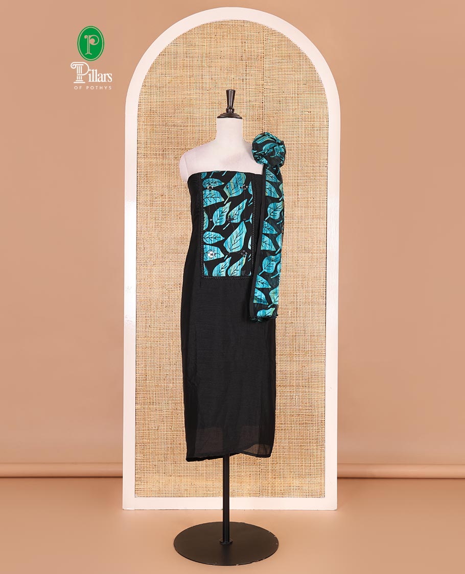 Black and blue material churidar set, neck leaf print with mirror work Vichitra silk top, plain santoon bottom, and leaf printed shimmer georgette dupatta