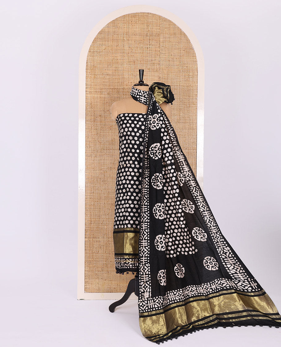 Black material chudidar set, polka dots batik printed modal chanderi top, batik motifs printed bottom, and a batik motifs printed modal chanderi dupatta