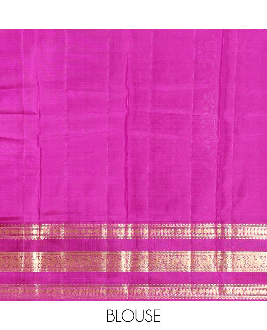 Blue Vasundhara Silk Saree Gracefully Embellished with Zari Buttas, Complemented by a Varisai Pettu Border Featuring Rekku, Muthu, Banaras, Rudraksham, and Mayil Designs, Majestically Woven with a Zari-Designed Pallu, and Paired with a Contrast Blouse