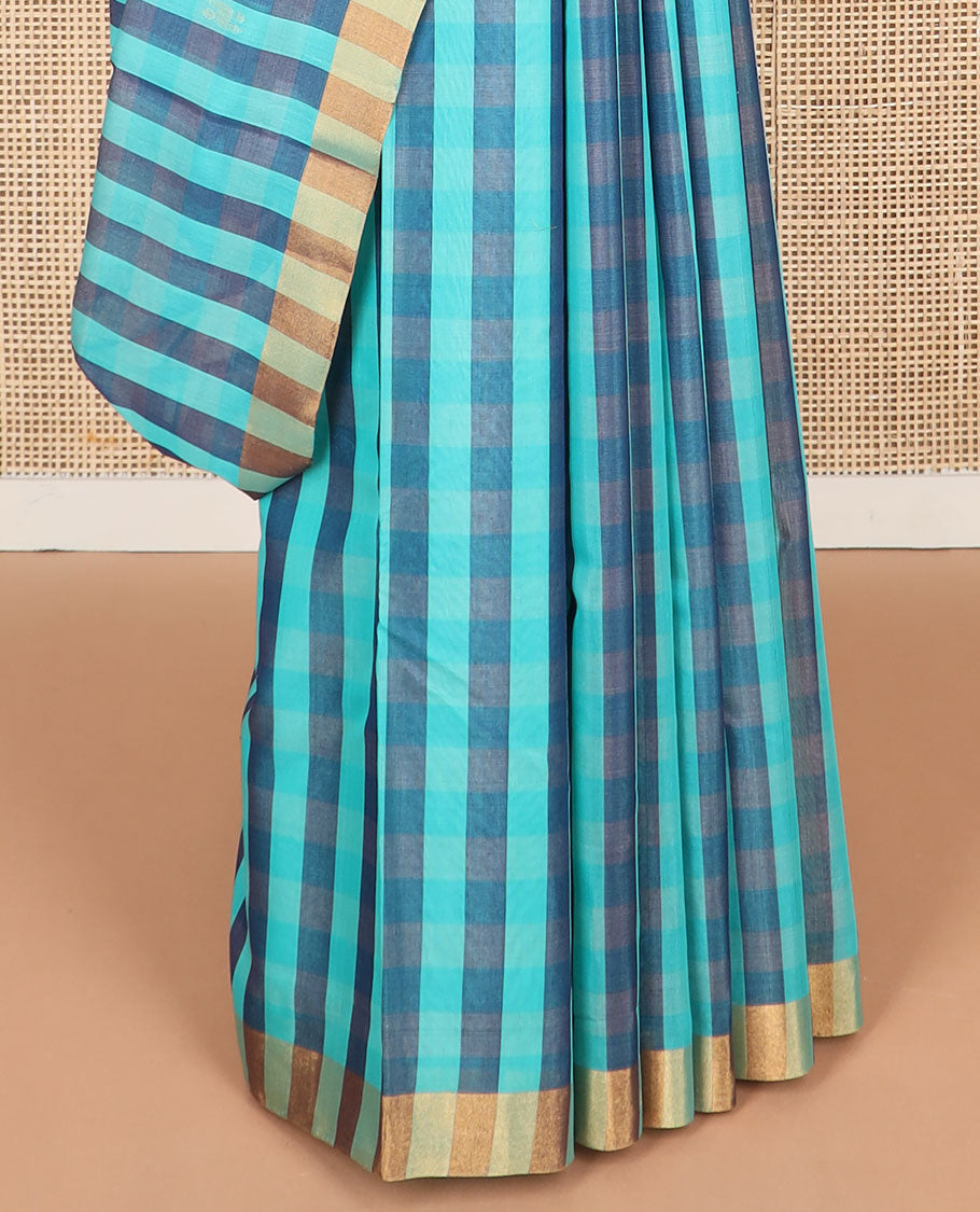 Blue checked silk cotton saree with contrast striped border & floral design pallu