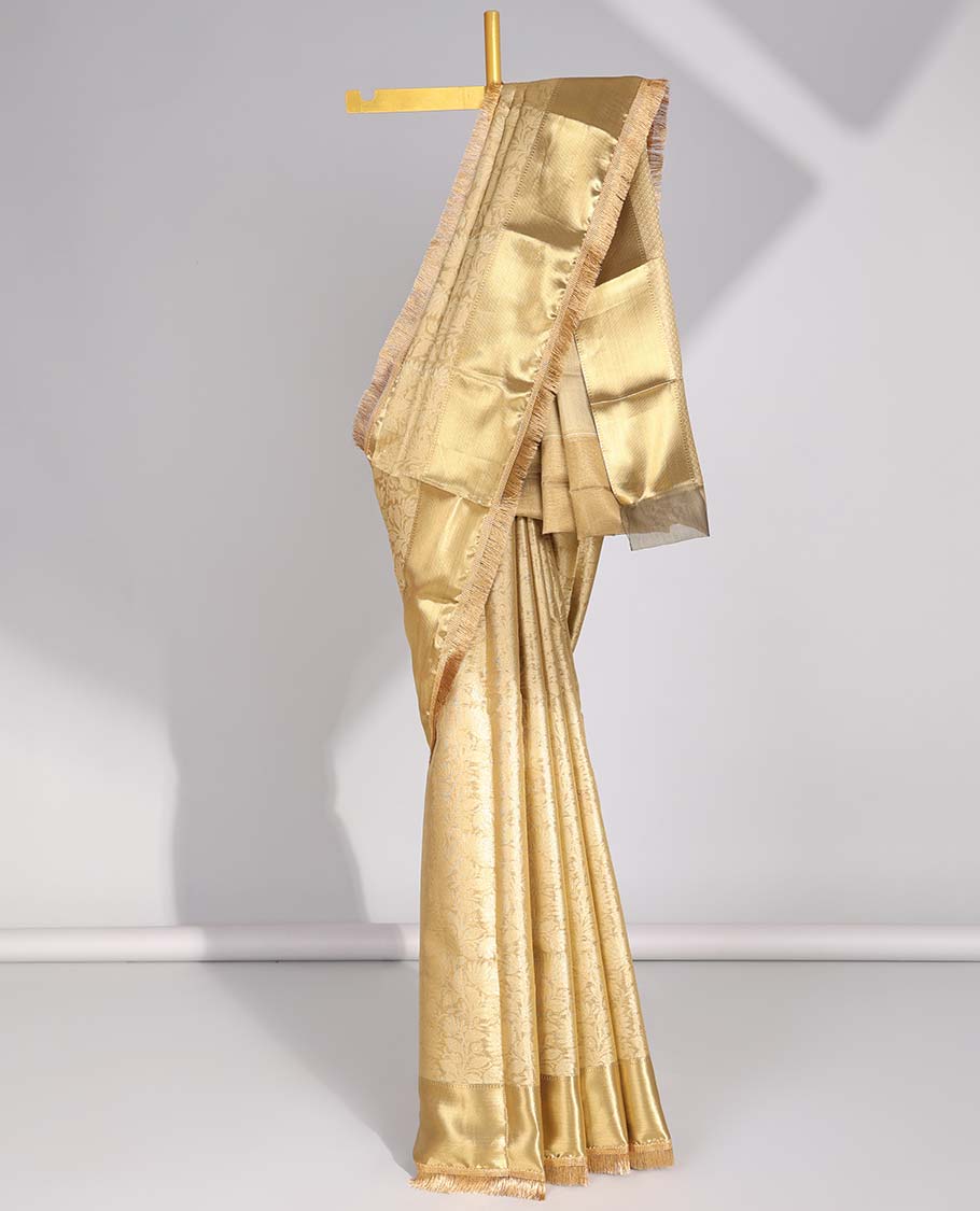 Light brown floral jacqaurd tissue saree with self zari design & intricate zari design pallu