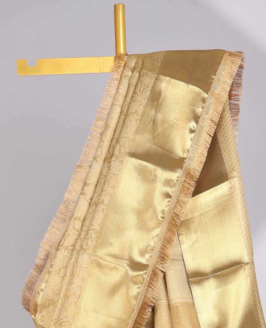Light brown floral jacqaurd tissue saree with self zari design & intricate zari design pallu