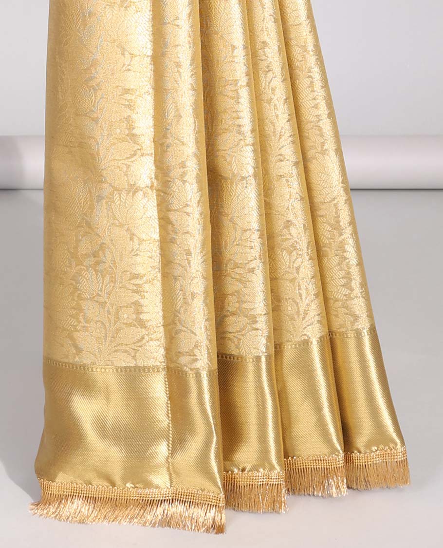 Light brown floral jacqaurd tissue saree with self zari design & intricate zari design pallu