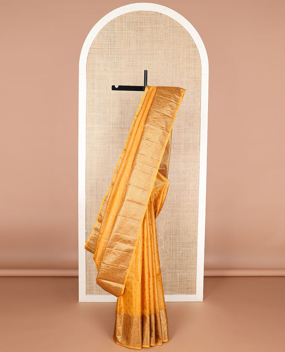 Orange floral motifs tussar silk saree with self floral design border & floral design pallu