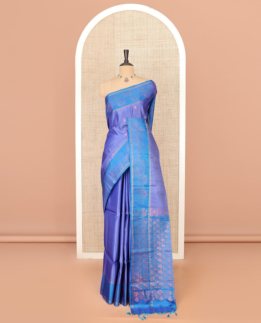 Blue Semi Uppada Saree Ornamented with Zari Buttas, Complemented by a Contrast Zari Woven Border, Pallu of Floral and Leaf Designs, and Paired with a Contrast Blouse