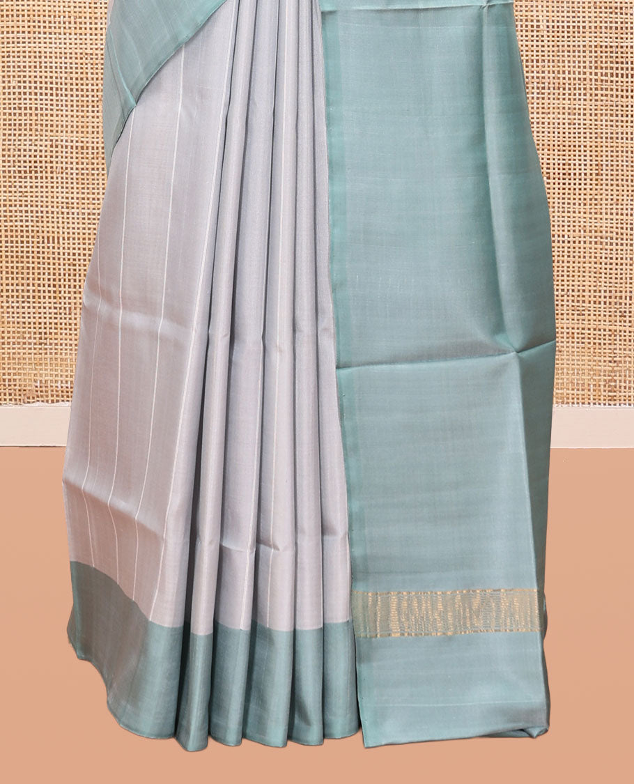 Light Grey Striped Uppada Silk Saree, Complemented by a Contrast Border, Plain Pallu, and a Contrast Blouse