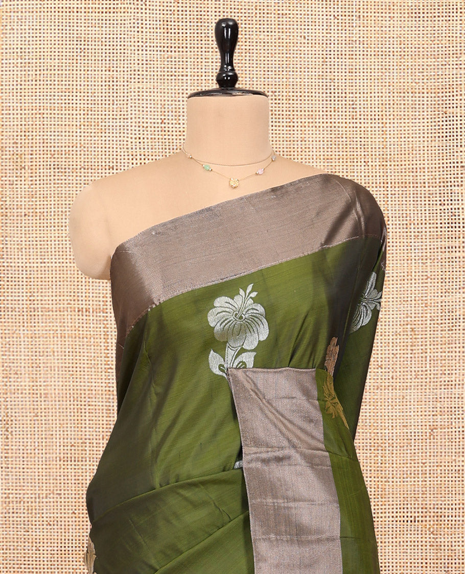 Dark Green Semi Uppada Saree, Decked up with Hibiscus Floral Buttas, a Bavanji Border, Contrast Intricate Pallu, and a Contrast Blouse