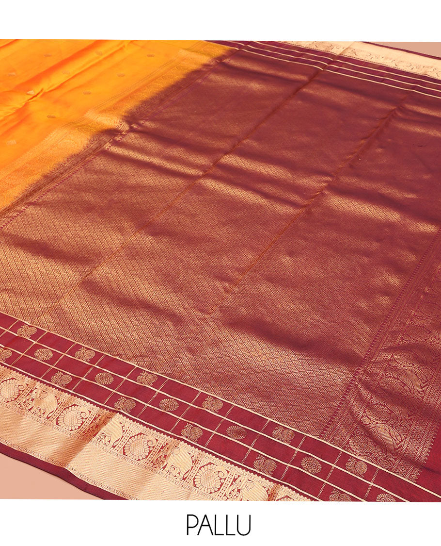 Orange Vasundhara Lite-Silk Mix Saree, Enthralled with Zari Buttas All Over Its Body, Complemented by a Contrast Annam Chakram Enclosed Checked Border of Kamalam, Manga, and Yaanai Designs, Grand Pallu of Jaal Designs, and Paired with a Contrast Blouse