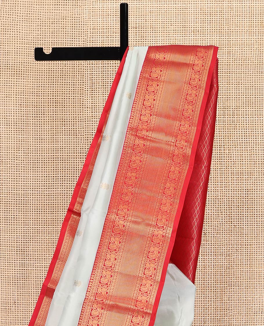 Off-White Vasundhara Lite-Silk Mix Saree, Enthralled with Iruthalai Pakshi Buttas, a Contrast Border of Thilakam Mokku, Muthu, Paisa, and Mayil Designs, Grand Pallu, and a Contrast Blouse