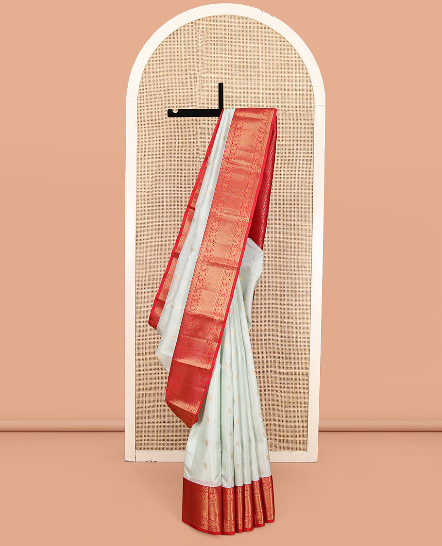 Off-White Vasundhara Lite-Silk Mix Saree, Enthralled with Iruthalai Pakshi Buttas, a Contrast Border of Thilakam Mokku, Muthu, Paisa, and Mayil Designs, Grand Pallu, and a Contrast Blouse