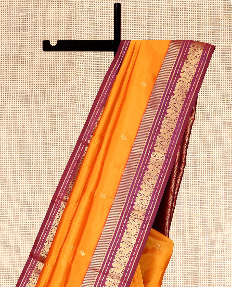 Orange Vasundhara Lite Silk Mix Saree, Gleamed Up with Zari Buttas, Contrast Border of Banaras, Banaras, Muthu, and Mayil Designs, Mayil Pallu, and a Contrast Blouse