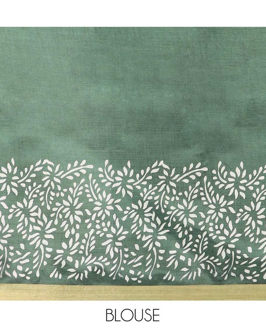 Green Banana Pith Saree Highlighted with Floral Motifs Printed All Over Its Body, Zari Bavanji Border, Pallu of Print and Zari Work, and Paired with a Matching Blouse