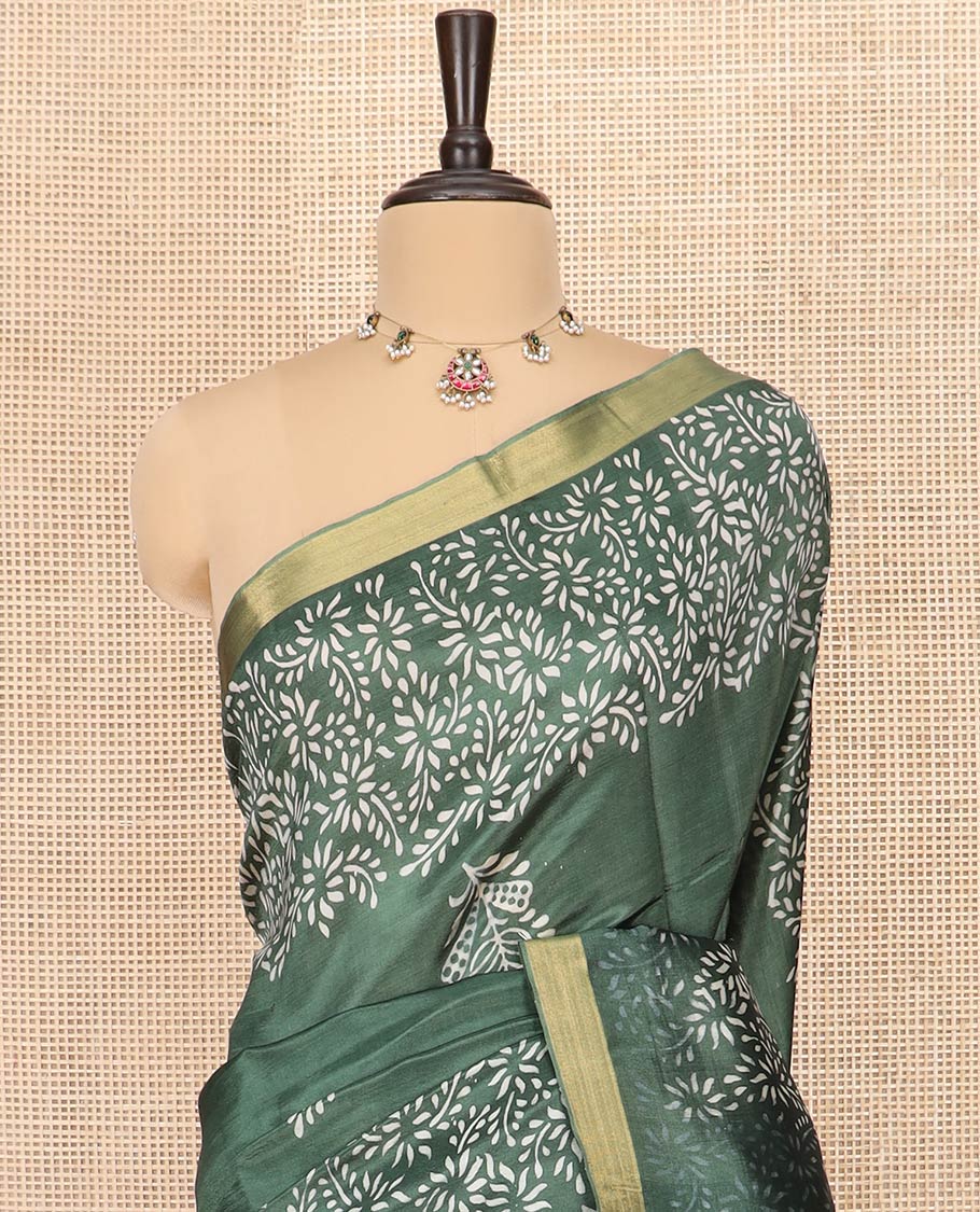 Green Banana Pith Saree Highlighted with Floral Motifs Printed All Over Its Body, Zari Bavanji Border, Pallu of Print and Zari Work, and Paired with a Matching Blouse