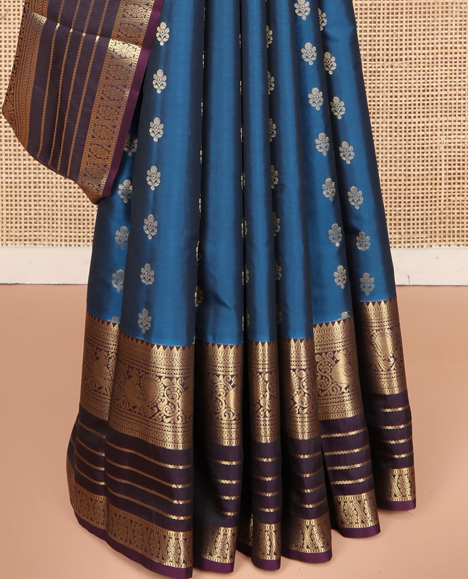 Blue Vasundhara Lite Silk Mix Saree, Mesmerized with Zari Buttas on Its Body, Complemented by a Contrast Varisai Pettu Border of Rekku, Muthu, Neli, Mayil, and Cross Kamalam Designs, Beautifully Bedecked Pallu, and Paired with a Contrast Blouse
