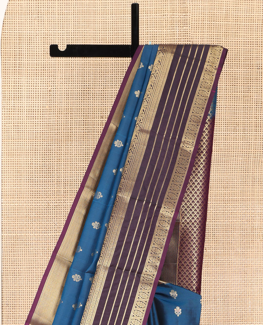 Blue Vasundhara Lite Silk Mix Saree, Mesmerized with Zari Buttas on Its Body, Complemented by a Contrast Varisai Pettu Border of Rekku, Muthu, Neli, Mayil, and Cross Kamalam Designs, Beautifully Bedecked Pallu, and Paired with a Contrast Blouse