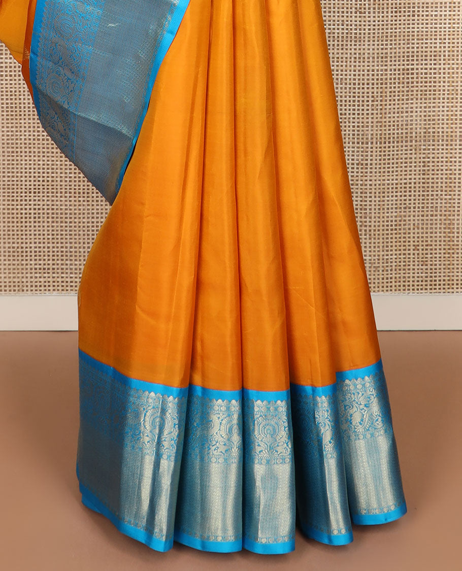 Orange zari buttas silk saree, contrast border of salngai,poun,kili,kamalam & mayil kann & jaal pallu