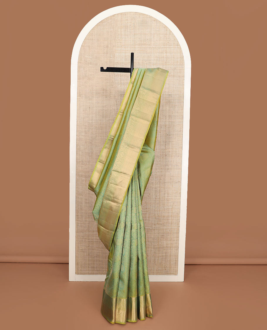 Green jacquard Kanchipuram wedding silk saree, traditional zari design border, and intricate pallu