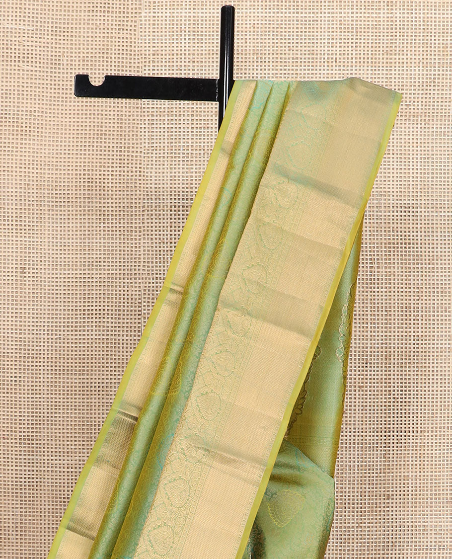 Green jacquard Kanchipuram wedding silk saree, traditional zari design border, and intricate pallu