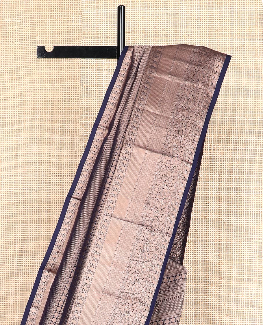 Blue jacquard Kanchipuram wedding silk saree, zari border of thilakam mokku, chakram, kathir, manga, kuyil kann, jaal, and manga designs, and jaal pallu