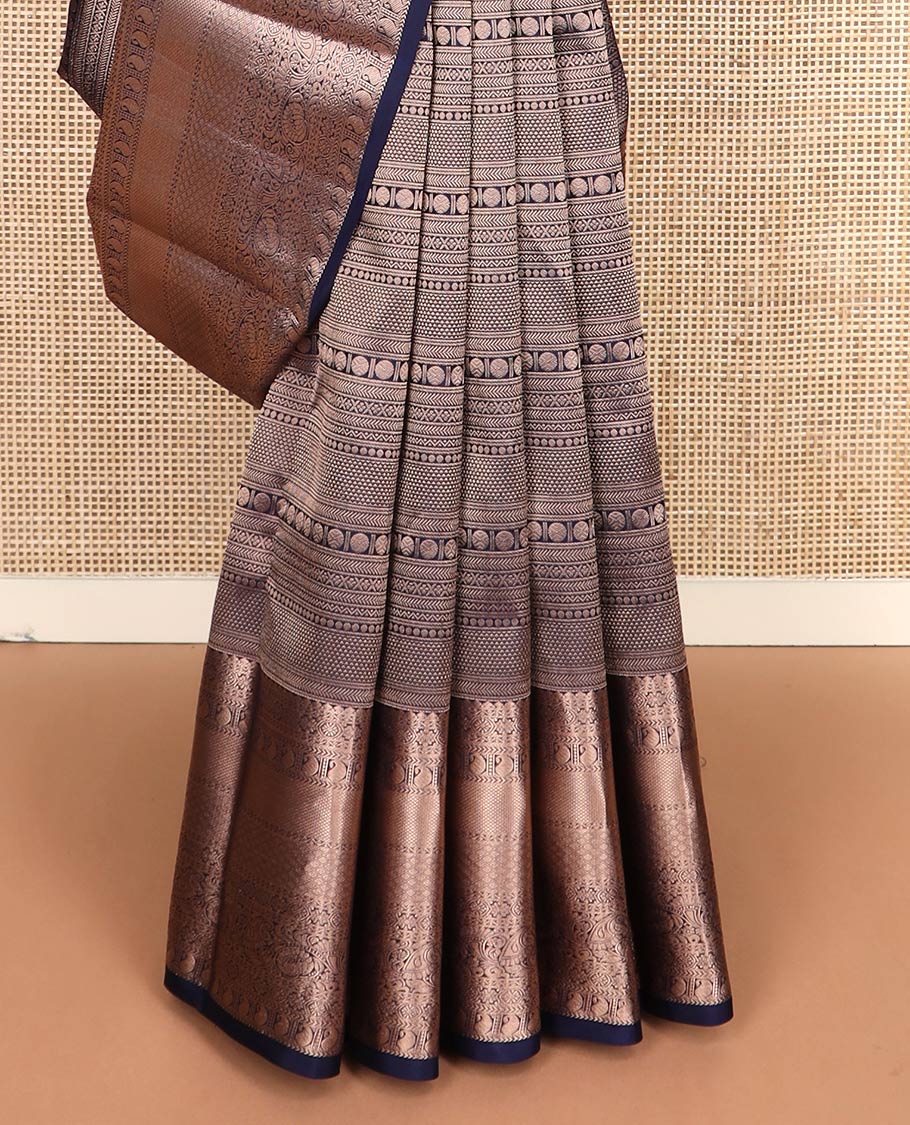 Blue jacquard Kanchipuram wedding silk saree, zari border of thilakam mokku, chakram, kathir, manga, kuyil kann, jaal, and manga designs, and jaal pallu