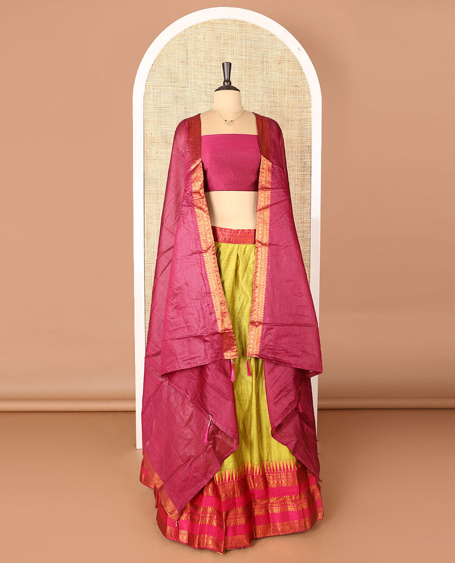 Green art-silk half-saree, plain with contrast temple traditional design bordered skirt, contrast blouse, and plain zari bordered dhavani