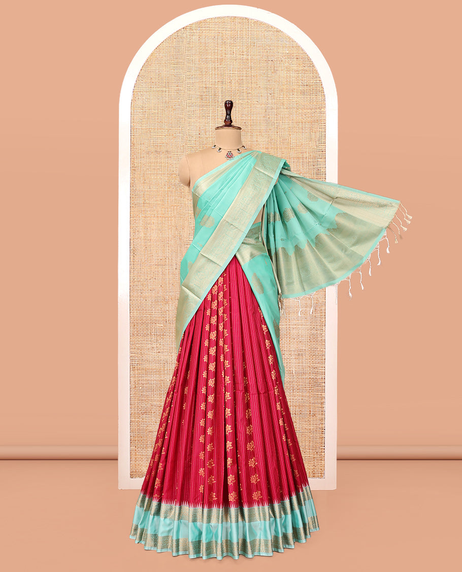 Red Art Silk Half-Saree Pavadai Material Gleamed Up with Zari-Buttas Skirt, a Contrast Traditional Border, Contrast Blouse, and Intricate Dhavani