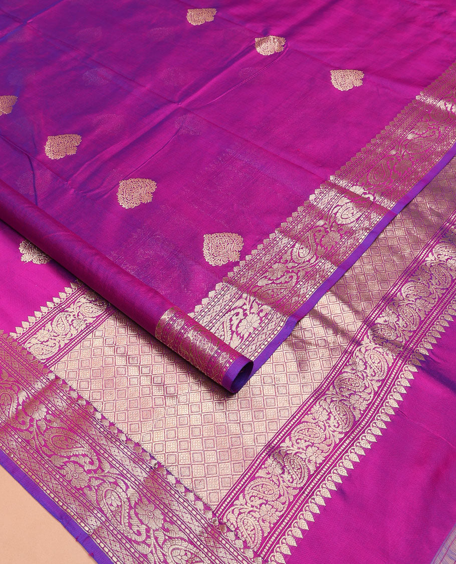 Purple zari buttas kathan silk saree, traditional border of paisley creeper designs, and jaal pallu