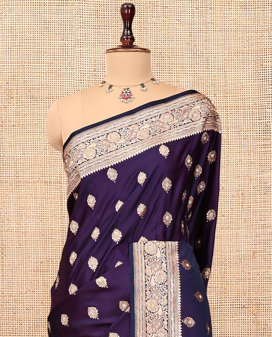 Dark Purple Banarasi Satin Saree, Ornamented with Zari Buttas, a Floral Creeper Border, Intricate Stonework Pallu, and a Matching Blouse