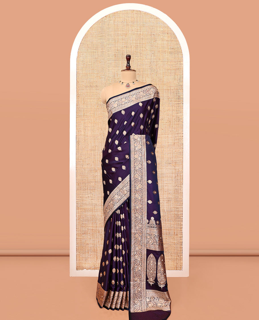 Dark Purple Banarasi Satin Saree, Ornamented with Zari Buttas, a Floral Creeper Border, Intricate Stonework Pallu, and a Matching Blouse