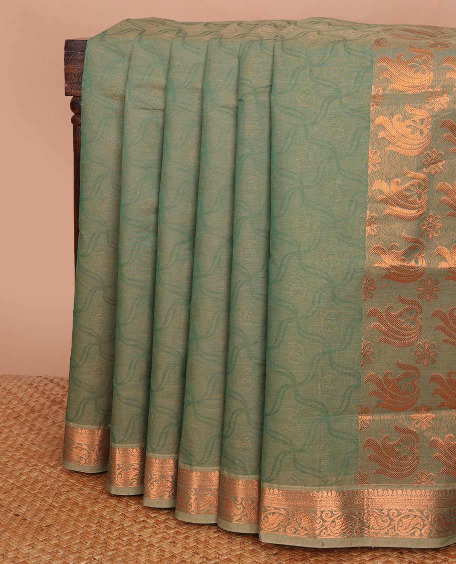 Green geometric-patterned Coimbatore cotton saree, traditional zari border & floral-paisley zari pallu