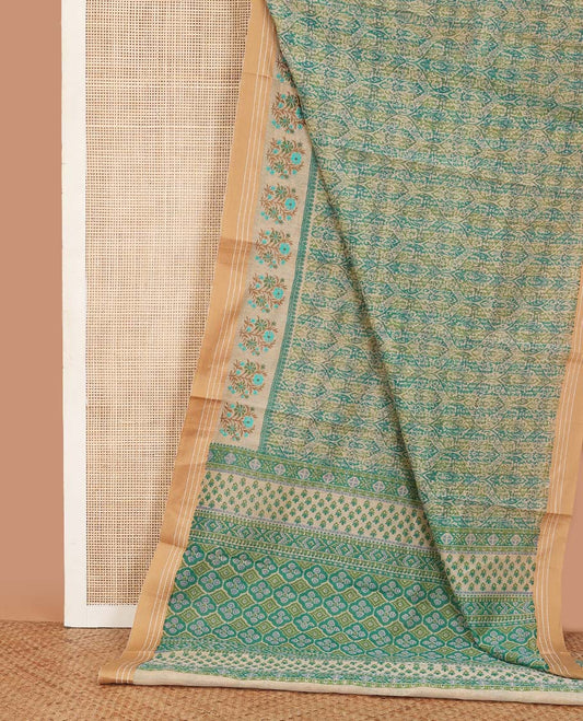 Blue ogee printed chanderi cotton saree, contrast traditional motifs with floral thread embroidery, and printed pallu