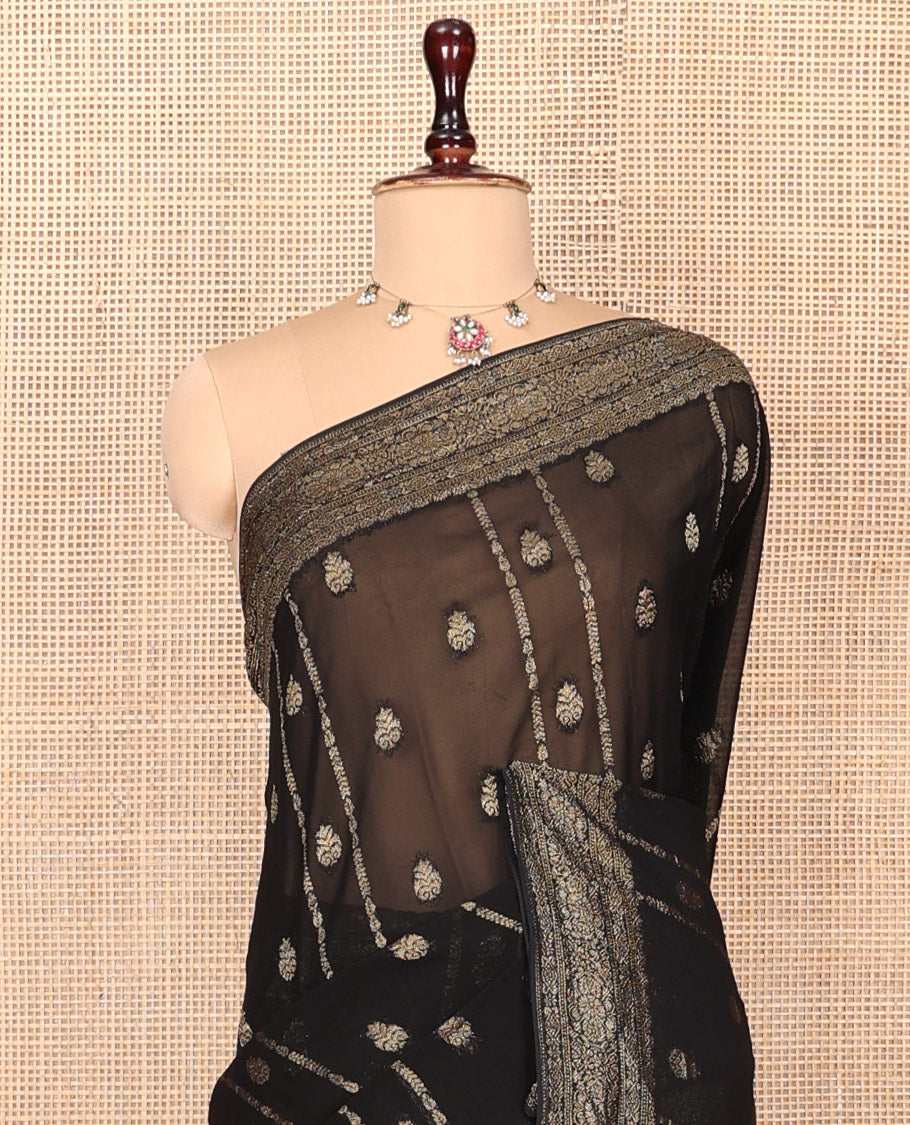 Black Georgette Saree, Enriched with Buttas and Stripes, Highlighted by a Traditional Border, Pallu of Intricate Designs, and a Matching Blouse