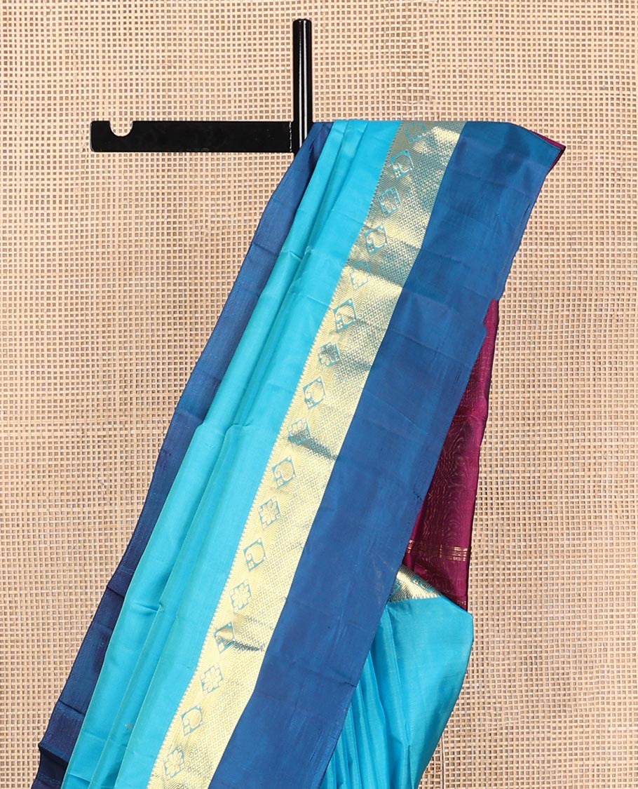 Blue zari buttas Kanchipuram silk saree, contrast border of thazampoo rekku,muthu,kamalam,manga, and kuyil kann, and zari design pallu