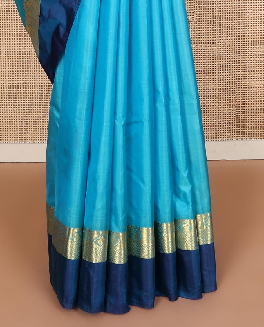 Blue zari buttas Kanchipuram silk saree, contrast border of thazampoo rekku,muthu,kamalam,manga, and kuyil kann, and zari design pallu