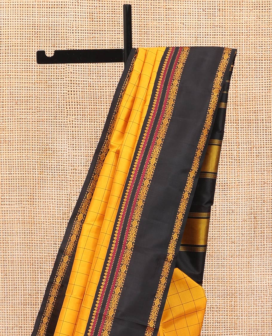 Yellow Kanchipuram Silk Saree, Sparsely Woven with Checked Design All Over Its Body, Complemented by a Contrast Rettai Pettu Border of Thilakam, Muthu, and Jada Nagam Designs, Pallu of Thazampoo Rekku Designs, and Paired with a Contrast Blouse