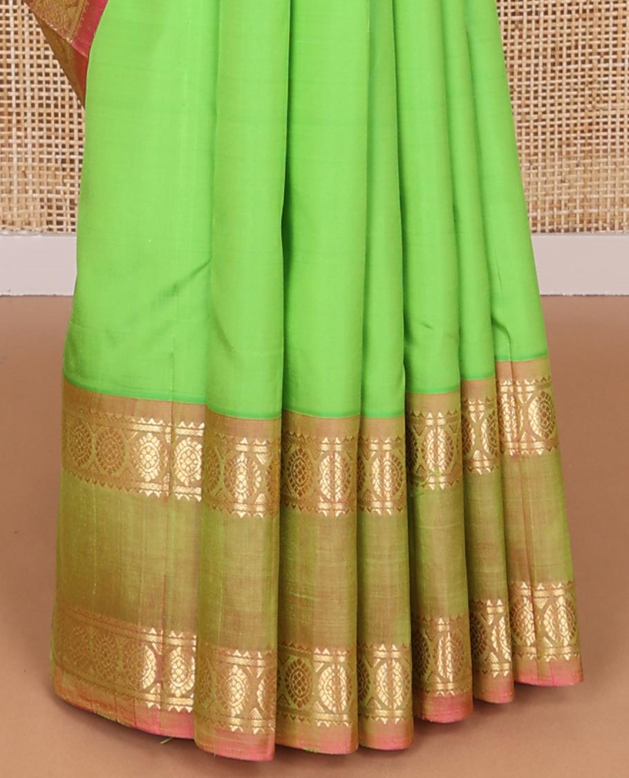 Green buttas kancheepuram silk saree with contrast rettai pettu border of rekku, banaras, poo chakram design & zari design pallu