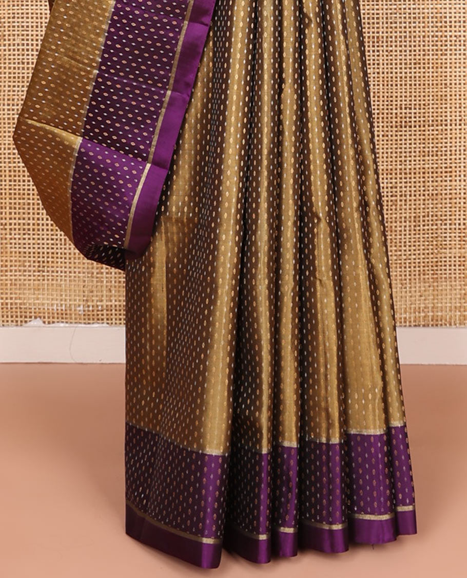 Mehendi green buttas soft silk saree, contrast buttas woven border, and pallu of geometric patterns