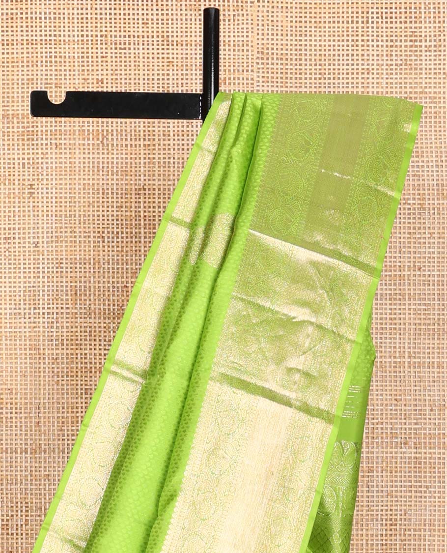 Green floral design silk saree with self border of thilakam mokku, paun, kodi visiry, banaras design & zari design pallu