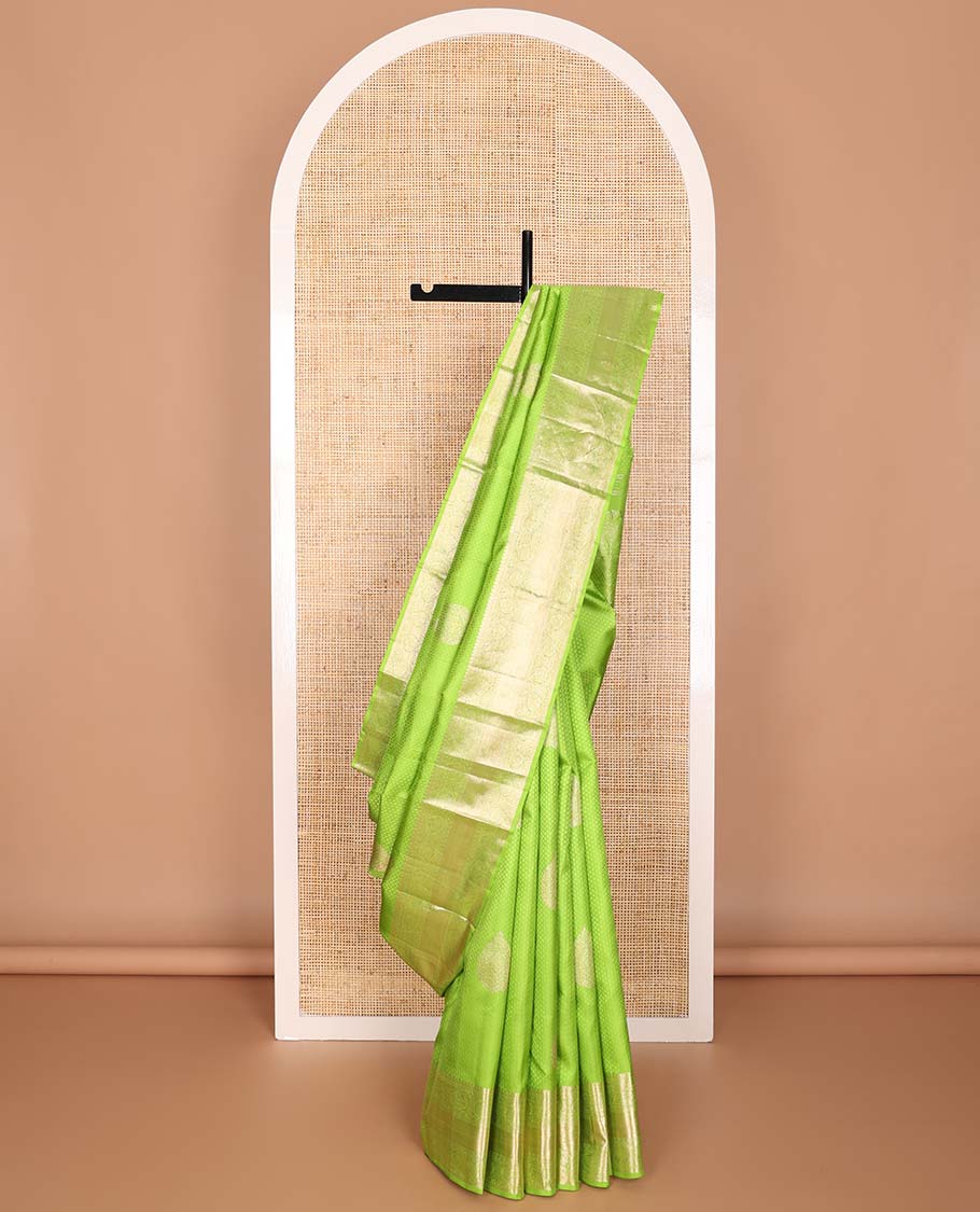 Green floral design silk saree with self border of thilakam mokku, paun, kodi visiry, banaras design & zari design pallu
