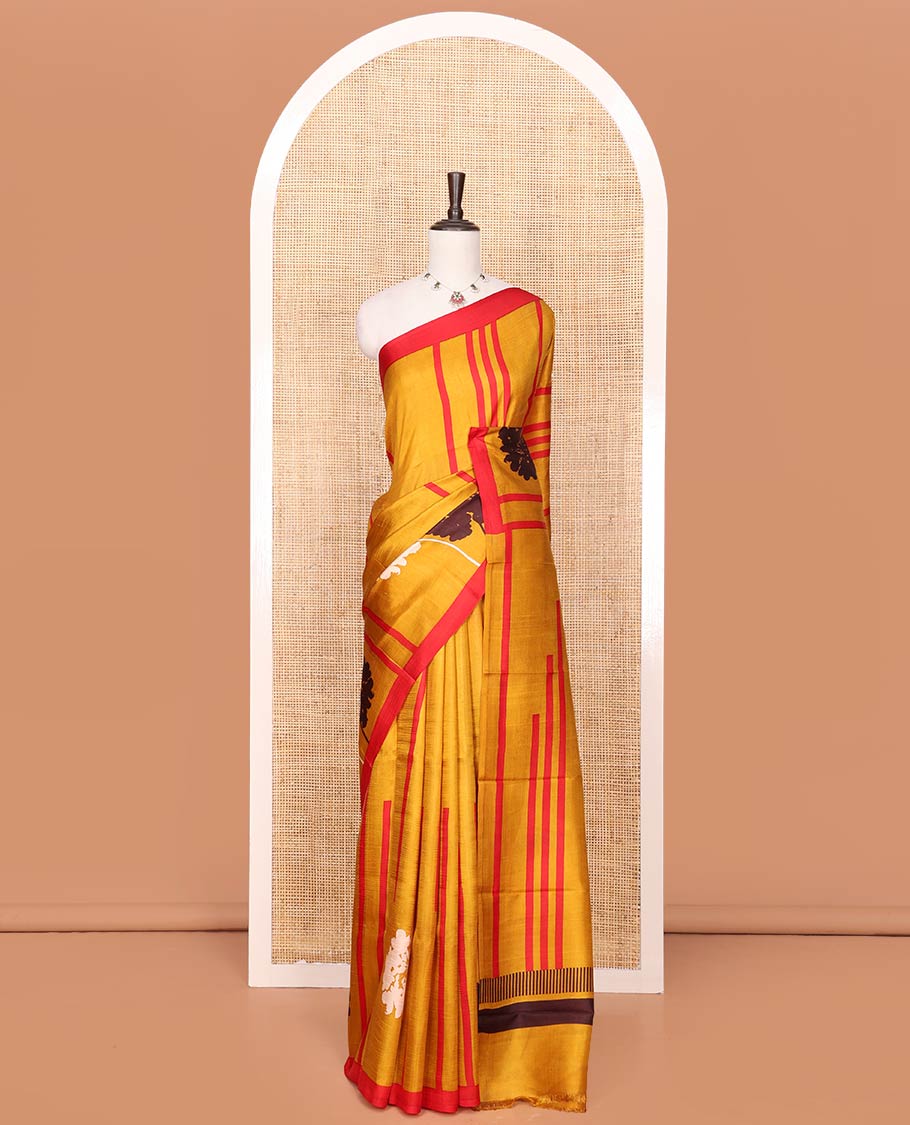 Mustard Printed Silk Saree Embellished with Stripes and Floral Buttas on Its Body, Complemented with a Contrast Border, Pallu of Floral Print, and Paired with a Contrast Plain Blouse