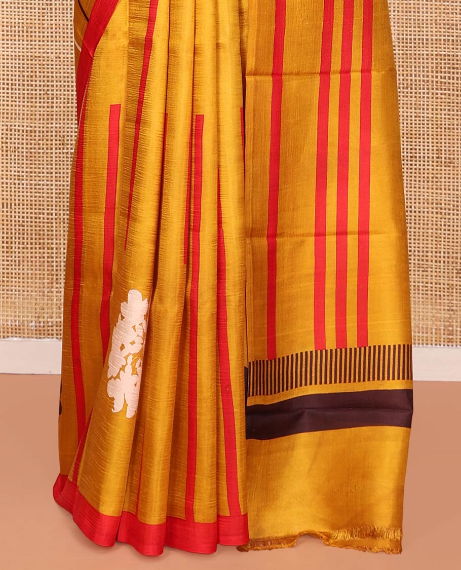 Mustard Printed Silk Saree Embellished with Stripes and Floral Buttas on Its Body, Complemented with a Contrast Border, Pallu of Floral Print, and Paired with a Contrast Plain Blouse