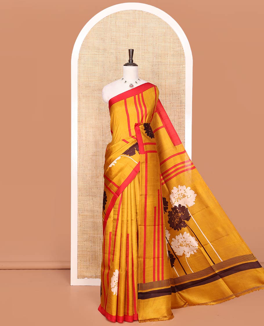 Mustard Printed Silk Saree Embellished with Stripes and Floral Buttas on Its Body, Complemented with a Contrast Border, Pallu of Floral Print, and Paired with a Contrast Plain Blouse