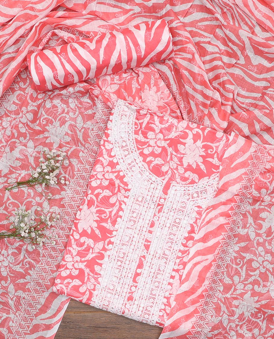 Pink cotton material churidar set, floral printed with neck embroidered top, tiger skin style printed bottom, and dupatta of floral and animal print