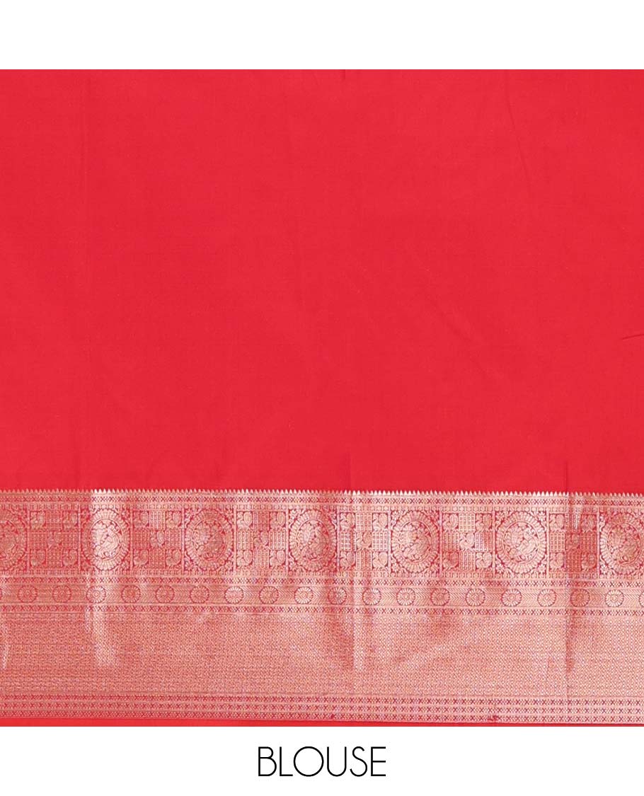 Red chakram zari buttas Vasundhara silk mix saree, zari border of rekku, cross kamalam, round mayil, chakram and then kuli kann and vanki design pallu